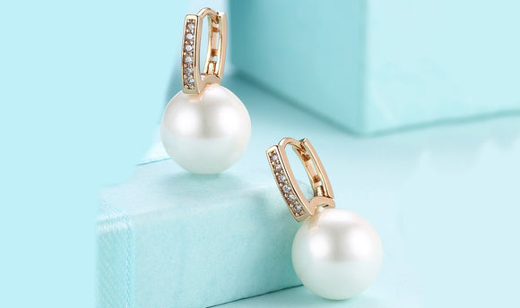 Micro-Pav'e Swarovski Crystal Curved Pearl Huggie Earrings Set in 18K Gold - Presidential Brand (R)